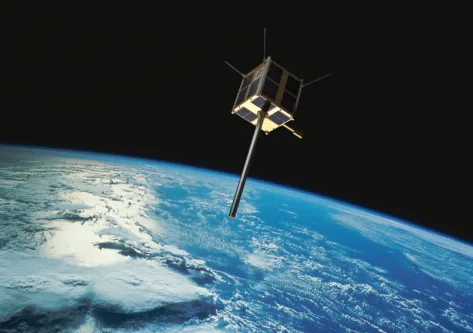 Illustrasjon av AISSat-1 i bane.
