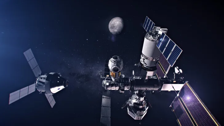 Gateway, den planlagte internasjonale romstasjonen rundt månen, med et Orion-fartøy som er på vei til å dokke.